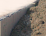 Extrusion plate for filling soil