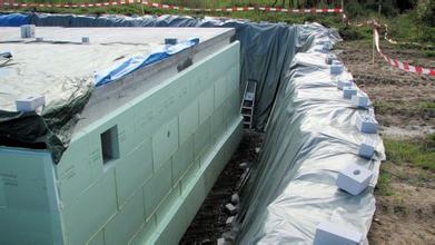 Extruded panels for basement enclosure